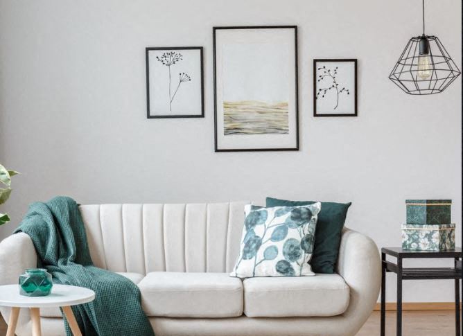 a living room with a couch and pillows